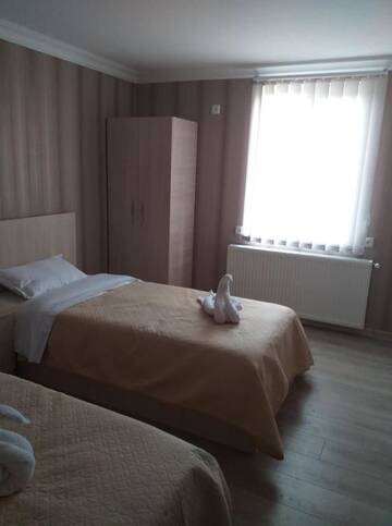Фото номера Двухместный номер с 2 отдельными кроватями и окном Гостевой дом Grandfather Hotel Anzori г. Dedoplis Tskaro 6